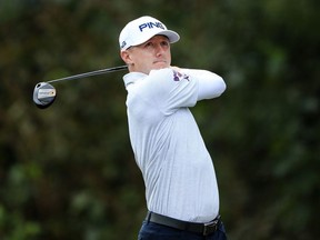 Mackenzie Hughes of Canada plays his shot from the 12th tee during the second round of the Houston Open at the Golf Club of Houston on October 10, 2019 in Humble, Texas.