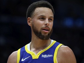 Stephen Curry of the Golden State Warriors looks on during the game against the New Orleans Pelicans  at Smoothie King Center on October 28, 2019 in New Orleans, Louisiana.