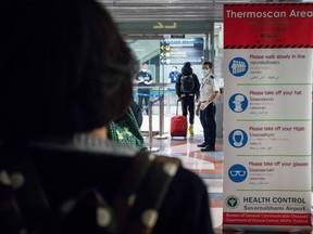 Public Health Officials run thermal scans on passengers arriving from Wuhan, China at Suvarnabumi Airport on Jan. 8, 2020 in Bangkok, Thailand. (Lauren DeCicca/Getty Images)