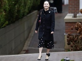 Huawei Technologies Chief Financial Officer Meng Wanzhou leaves her house on her way to a court appearance on the first day of her extradition trial on January 20, 2020 in Vancouver, Canada.