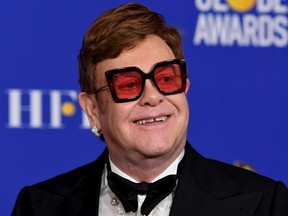 Elton John poses in the press room with the award for Best Original Song - Motion Picture during the 77th Annual Golden Globe Awards at The Beverly Hilton Hotel on January 05, 2020 in Beverly Hills, California.