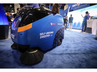 The Velodyne Lidar Self-Driving Sweeper robot is displayed at CES 2020 at the Las Vegas Convention Center in Las Vegas on Jan. 8, 2020.