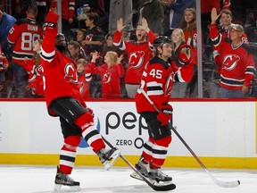 P.K. Subban and Sami Vatanen of the New Jersey Devils react after defeating the Tampa Bay Lightning at Prudential Center on January 12, 2020 in Newark, New Jersey.