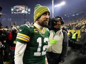 Aaron Rodgers of the Green Bay Packers reacts after defeating the Seattle Seahawks 28-23 in the NFC Divisional Playoff game at Lambeau Field on January 12, 2020 in Green Bay, Wisconsin.