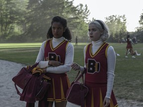 Rosalind Walker (Jaz Sinclair) and Sabrina Spellman (Kiernan Shipka) get into cheerleading in season three of "The Chilling Adventures of Sabrina."