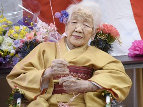 Kane Tanaka, born in 1903, smiles as a nursing home celebrates three days after her 117th birthday in Fukuoka, Japan, in this photo taken by Kyodo January 5, 2020. (Kyodo/via REUTERS)