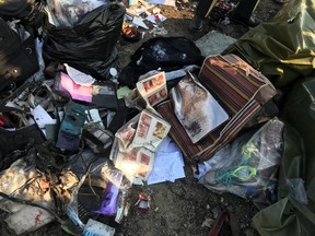 Passengers' belongings are seen after the Ukraine International Airlines plane crashed after take-off from Iran's Imam Khomeini airport, on the outskirts of Tehran, Iran Jan. 8, 2020. (Nazanin Tabatabaee/West Asia News Agency via REUTERS)