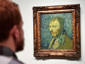 A man looks at Dutch post-impressionist painter Vincent van Gogh's self portrait, painted during a psychotic episode, at the Van Gogh Museum in Amsterdam, Netherlands Jan. 20, 2020. (REUTERS/Piroschka van de Wouw)
