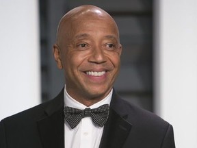 Hip-hop pioneer Russell Simmons arrives to the 2015 Vanity Fair Oscar Party in this February 22, 2015, file photo in Beverly Hills, California.