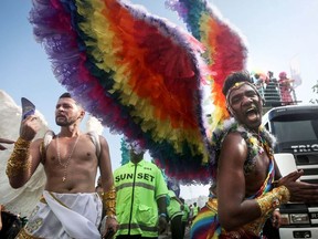Revelers celebrate during the annual gay pride parade on Copacabana beach December 11, 2016 in Rio de Janeiro, Brazil.