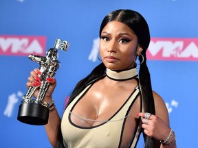 US/Trinidadian rapper Nicki Minaj holds her award for best hip-hop video in the press room at the 2018 MTV Video Music Awards at Radio City Music Hall on August 20, 2018 in New York City.