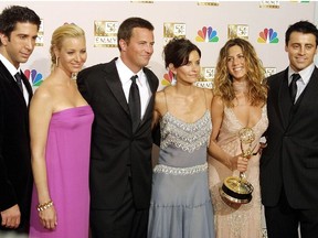 In this file photo taken on September 21, 2002, cast members from "Friends," which won Outstanding Comedy, series pose at the 54th Annual Emmy Awards in the Shrine Auditorium in Los Angeles.  From L to R are David Schwimmer, Lisa Kudrow, Mathew Perry, Courtney Cox Arquette, Jennifer Aniston and Matt LeBlanc.