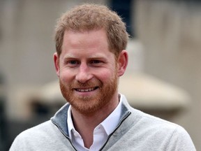 In this file photo taken on May 06, 2019 Britain's Prince Harry, Duke of Sussex, speaks to members of the media at Windsor Castle in Windsor, west of London on May 6, 2019.