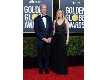 Actress Michelle Pfeiffer and husband writer/producer David E. Kelley arrive for the 77th annual Golden Globe Awards on January 5, 2020, at The Beverly Hilton hotel in Beverly Hills, California. (Photo by VALERIE MACON / AFP)