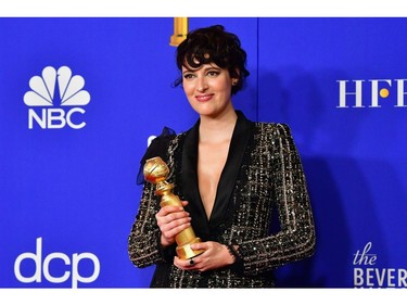 British actress Phoebe Waller-Bridge poses in the press room with the award for Best Performance by an Actress in a Television Series - Musical or Comedy during the 77th annual Golden Globe Awards on January 5, 2020, at The Beverly Hilton hotel in Beverly Hills, California. (Photo by FREDERIC J. BROWN / AFP)