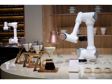 The LG CLOi CoBot Barista robot prepares to makes pour-over coffee at the LG booth, Jan. 8, 2020, at the 2020 Consumer Electronics Show (CES) in Las Vegas