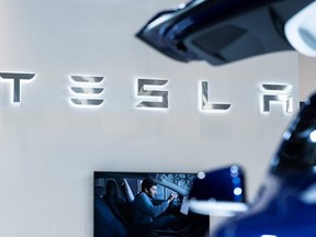 A Tesla logo is pictured during the Brussel Motor Show on January 9, 2020 in Brussel.
