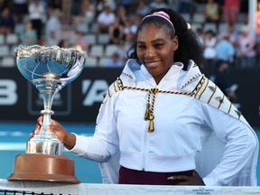 Serena Williams of the US poses with her trophy after winning against Jessica Pegula of the US during their women's singles final match during the Auckland Classic tennis tournament in Auckland on January 12, 2020.