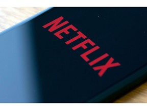 In this file photo taken on July 10, 2019 the Netflix logo is seen on a phone in this photo illustration in Washington, D.C.