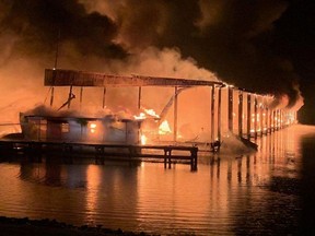 A row of boats are engulfed in flames after catching fire at the marina in Scottsboro, Alabama, U.S. January 27, 2020.