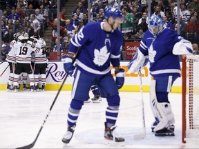 Toronto Maple Leafs goalie Frederik Andersen and defenceman Martin Marincin react as the Chicago Blackhawks celebrate a goal on Saturday, Jan. 18, 2020.