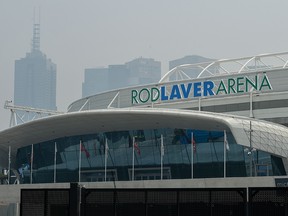 Smoke from bushfires hovers over the Rod Laver Arena ahead of the Australian Open in Melbourne on January 14, 2020. (WILLIAM WEST/AFP via Getty Images)