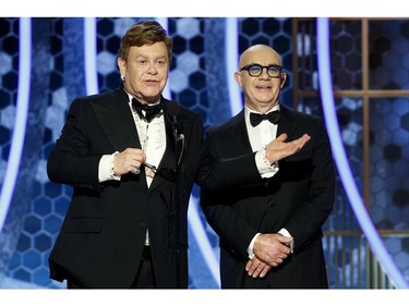 77th Golden Globe Awards - Show - Beverly Hills, California, U.S., January 5, 2020 - Elton John and Bernie Taupin. Paul Drinkwater/NBCUniversal/Handout via REUTERS For editorial use only. Additional clearance required for commercial or promotional use, contact your local office for assistance. Any commercial or promotional use of NBCUniversal content requires NBCUniversal's prior written consent. No book publishing without prior approval. NO SALES. NO ARCHIVES. ORG XMIT: LOA164