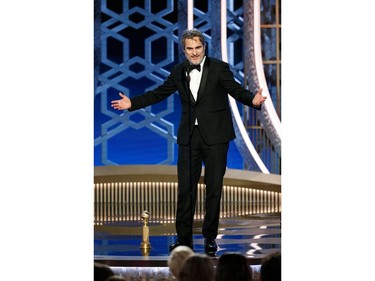 77th Golden Globe Awards - Show - Beverly Hills, California, U.S., January 5, 2020 - Joaquin Phoenix accepts the award for Best Actor - Motion Picture, Drama for "Joker."   Paul Drinkwater/NBC Universal/Handout via REUTERS For editorial use only. Additional clearance required for commercial or promotional use, contact your local office for assistance. Any commercial or promotional use of NBCUniversal content requires NBCUniversal's prior written consent. No book publishing without prior approval. NO SALES. NO ARCHIVES. ORG XMIT: LOA259