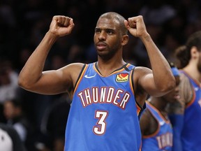 Oklahoma City Thunder guard Chris Paul reacts in the fourth quarter against the Brooklyn Nets at Barclays Center.