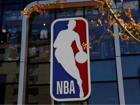 An NBA logo is seen on the facade of its flagship store at the Wangfujing shopping street in Beijing, China October 8, 2019.