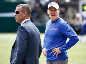 Head coach Sean McDermott of the Buffalo Bills stands with general manager Brandon Beane on the field before a game against the New York Jets at MetLife Stadium on Sept. 8, 2019 in East Rutherford, N.J.