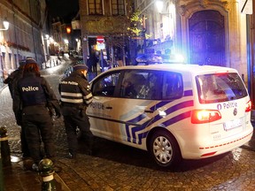 In this Nov. 22, 2015, file photo, a Belgian police vehicle is seen in central Brussels.