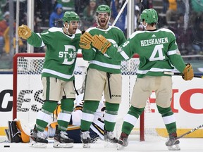 Stars left wing Blake Comeau (centre) celebrates with teammates after scoring a goal against the Predators during second period action in the 2020 NHL Winter Classic at Cotton Bowl Stadium in Dallas on Wednesday, Jan. 1, 2020.