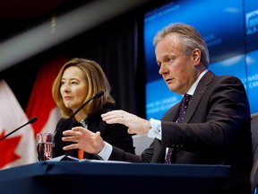 Bank of Canada governor Stephen Poloz gestures as he speaks next to senior deputy governor Carolyn Wilkins, during a news conference after announcing the latest rate decision in Ottawa, Jan. 22, 2020.