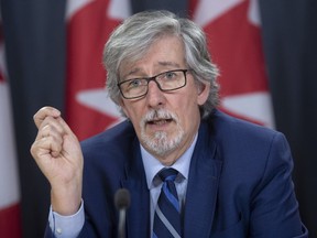 Privacy Commissioner Daniel Therrien speaks during a news conference in Ottawa, Tuesday, Dec. 10, 2019.