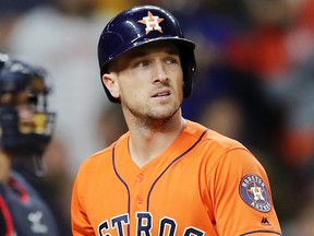 Alex Bregman of the Houston Astros reacts after striking out against the Washington Nationals during the fifth inning in Game Seven of the 2019 World Series at Minute Maid Park on Oct. 30, 2019 in Houston, Texas.