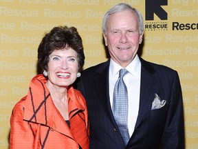 Former NBC news anchor Tom Brokaw (R) and Meredith Auld walk the red carpet for the International Rescue Committee's Annual Freedom Award benefit at the Waldorf Astoria Hotel on Nov. 9, 2011, in New York City.
