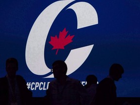 Supporters take their seats during the opening night of the federal Conservative leadership convention in Toronto on Friday, May 26, 2017.