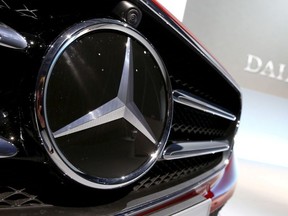 The Mercedes-Benz logo is seen before the company's annual news conference in Stuttgart, Germany, February 4, 2016.