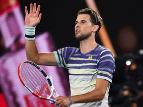 Austria's Dominic Thiem celebrates after defeating Spain's Rafael Nadal during their men's singles quarterfinal match at the Australian Open in Melbourne on Wednesday, Jan. 29, 2020.