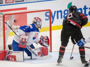 Canada's Liam Foudy scores the fourth goal on Slovakia's goaltender Samuel Hlavaj during second period quarterfinal action at the World Junior Hockey Championships on Thursday, Jan. 2, 2020 in Ostrava, Czech Republic.