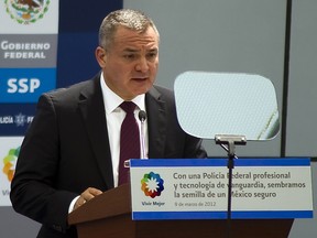 In this file photo taken on March 9, 2012 Mexican Secretary of Public Safety Genaro Garcia Luna speaks during the inauguration of the Federal Police's scientific division in Mexico City. (ALFREDO ESTRELLA/AFP via Getty Images)