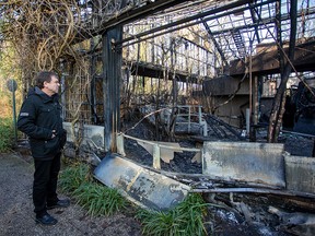 Wolfgang Dressen, manager of the Krefeld zoo, stands in front of the burned-out monkey house in Krefeld, Germany, on January 1, 2020. (CHRISTOPH REICHWEIN/dpa/AFP via Getty Images)