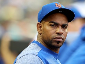 Yoenis Cespedes of the New York Mets looks on from the dugout in the first inning against the San Diego Padres on July 24, 2018 at Citi Field in the Flushing neighbourhood of the Queens borough of New York City.  (Elsa/Getty Images)