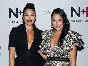 Beauty moguls, Nikki Bella and Brie Bella attend the Nikki and Brie Bella launch of their new product line during fashion week for Nicole and Brizee, N+B body and beauty line at Coco J'adore on September 5, 2019 in New York City.