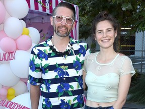 Christopher Robinson and Amanda Knox attend Hilarity For Charity's County Fair hosted by Seth Rogen & Lauren Miller Rogen at The Row on Sept. 14, 2019 in Los Angeles, Calif. (Gregg DeGuire/Getty Images for Hilarity for Charity)