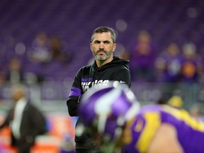 Offensive Coordinator Kevin Stefanski watches warm ups before the game against the Washington Redskins at U.S. Bank Stadium on October 24, 2019 in Minneapolis, Minnesota.