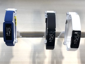 Fitbit activity trackers are displayed at a Best Buy store on Nov. 1, 2019 in San Rafael, Calif. (Justin Sullivan/Getty Images)