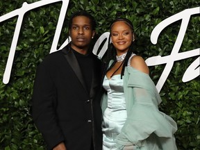 Barbadian singer Rihanna and US rapper ASAP Rocky poses on the red carpet upon arrival at The Fashion Awards 2019 in London on December 2, 2019.