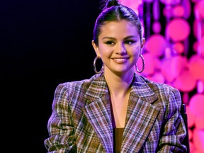 Selena Gomez speaks on stage at the iHeartRadio Album Release Party with Selena Gomez at iHeartRadio Theater on Jan. 9, 2020 in Burbank, Calif. (Kevin Winter/Getty Images for iHeart)